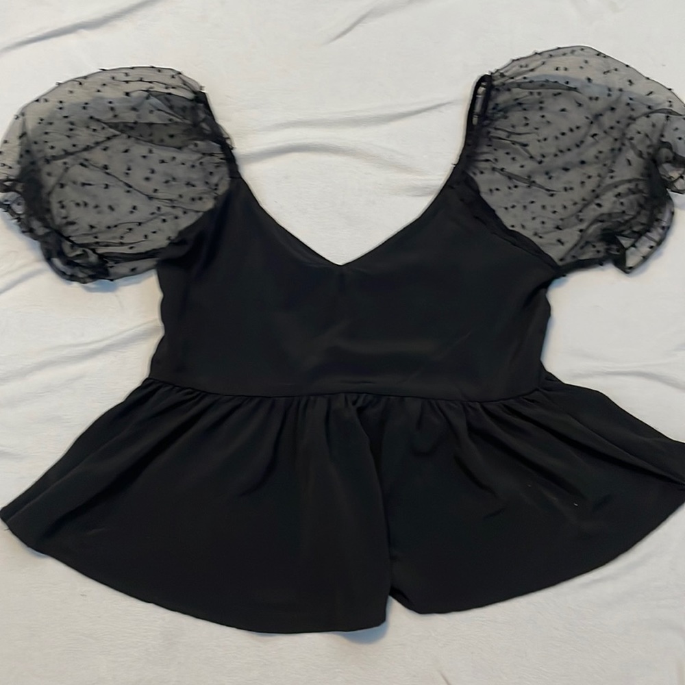 Francesca’s Mi Ami black shirt
